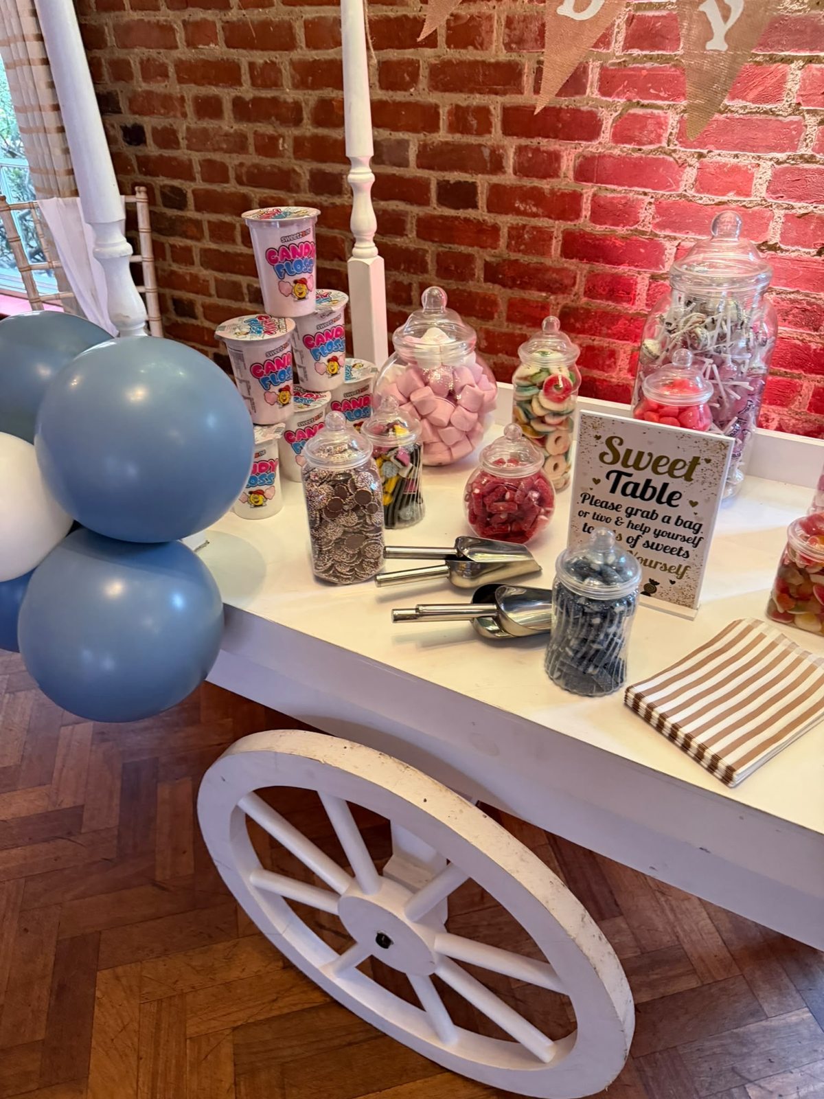 Baby shower welcome board with blue balloons