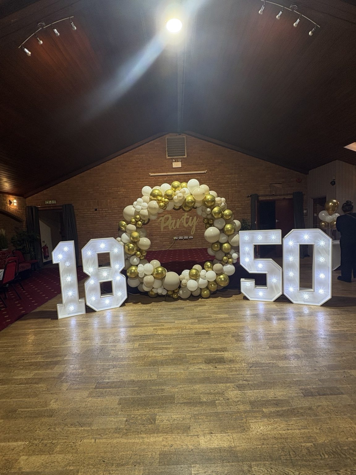 Real light-up 18 and 50 numbers with white and gold balloon hoop